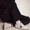 Ball Star pour homme en nappa blanc avec étoile et languette de talon bleues