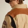 Blouson aviateur beige avec détails en cuir et patchs