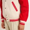 Blouson aviateur en coton blanc délavé et rouge avec broderies