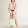 Blouson aviateur en denim teint en rose pour femme