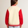 Blouson aviateur pour enfant en coton beige et rouge avec broderie sur la poitrine
