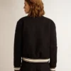 Blouson aviateur pour femme en laine bleu foncé avec des détails blancs