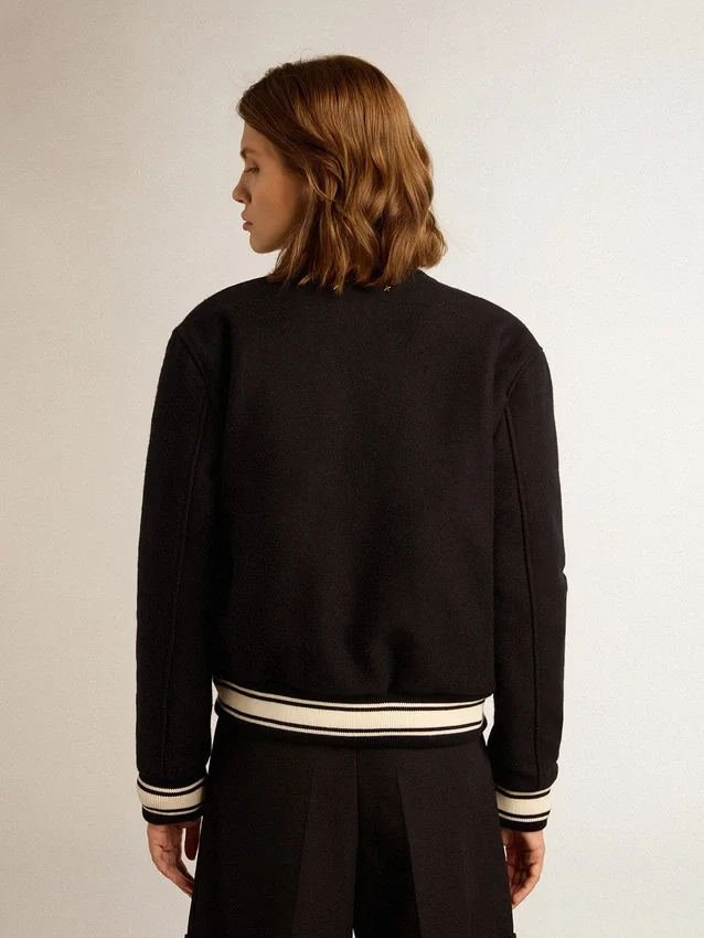 Blouson aviateur pour femme en laine bleu foncé avec des détails blancs