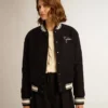 Blouson aviateur pour femme en laine bleu foncé avec des détails blancs