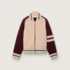 Blouson aviateur unisexe en maille jacquard blanche et bordeaux