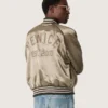 Blouson aviateur unisexe en satin vert avec ourlets et col côtelés