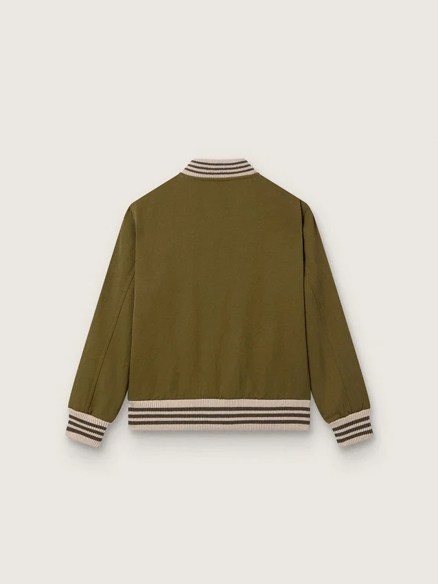 Blouson aviateur unisexe Journey en sergé de nylon vert militaire avec écusson brodé