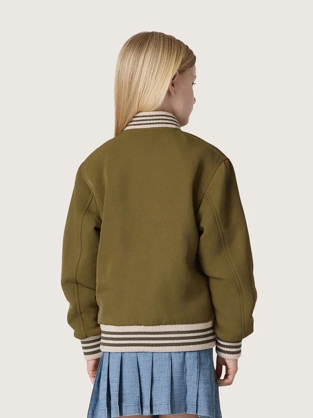 Blouson aviateur unisexe Journey en sergé de nylon vert militaire avec écusson brodé
