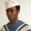Bonnet en laine blanc avec étoile noire