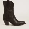 Bottes basses Wish Star en cuir noir avec étoile incrustée ton sur ton