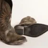 Bottes basses Wish Star pour femme en cuir noir ornées d’une étoile argentée