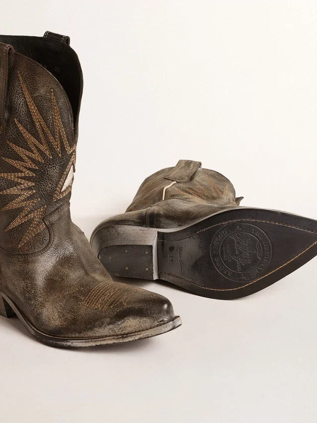 Bottes basses Wish Star pour femme en cuir noir ornées d’une étoile argentée
