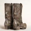 Bottes basses Wish Star pour femme en cuir noir ornées d’une étoile argentée