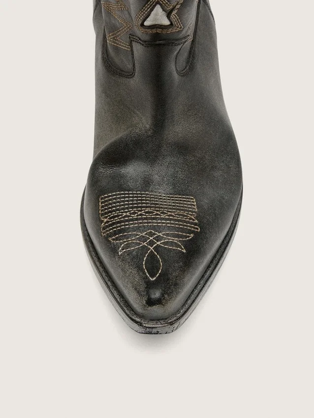Bottes basses Wish Star pour homme en cuir noir ornées d’une étoile argentée