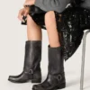 Bottes motardes hautes pour femme en cuir noir avec bride et boucle argentée