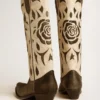 Bottes Wish Star en cuir noir et blanc avec incrustations de roses et d’étoiles