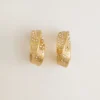 Boucles d’oreilles créoles dorées ornées de cristaux