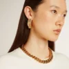Boucles d’oreilles créoles dorées ornées de cristaux
