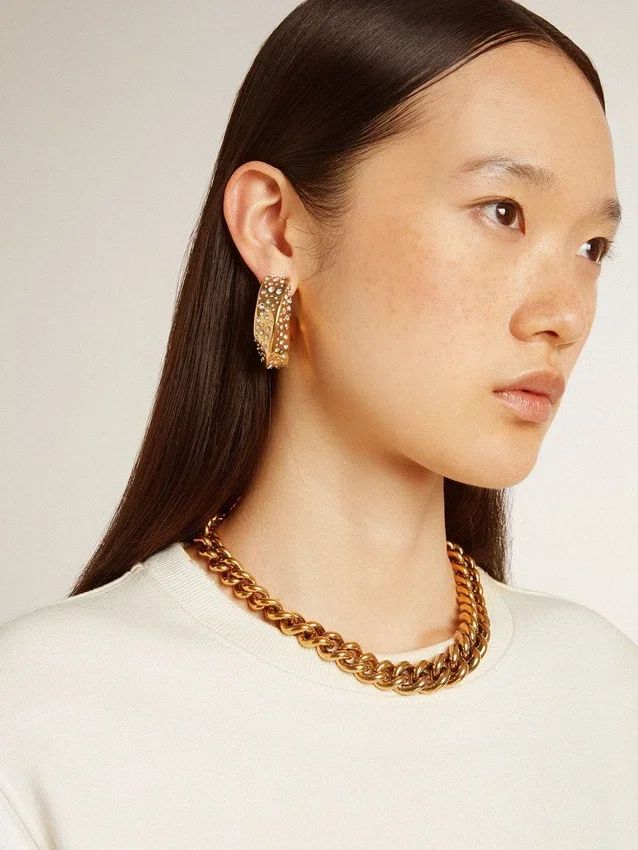 Boucles d’oreilles créoles dorées ornées de cristaux