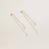 Boucles d’oreilles pendantes avec perles