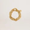 Bracelet à chaîne tissée couleur or antique avec fermoir en forme d’étoile