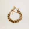 Bracelet à maillons décroissants en or antique avec fermoir en forme d’étoile