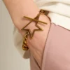 Bracelet à maillons décroissants en or antique avec fermoir en forme d’étoile