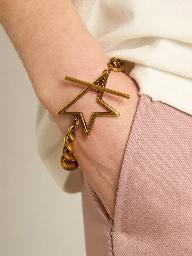 Bracelet à maillons décroissants en or antique avec fermoir en forme d’étoile