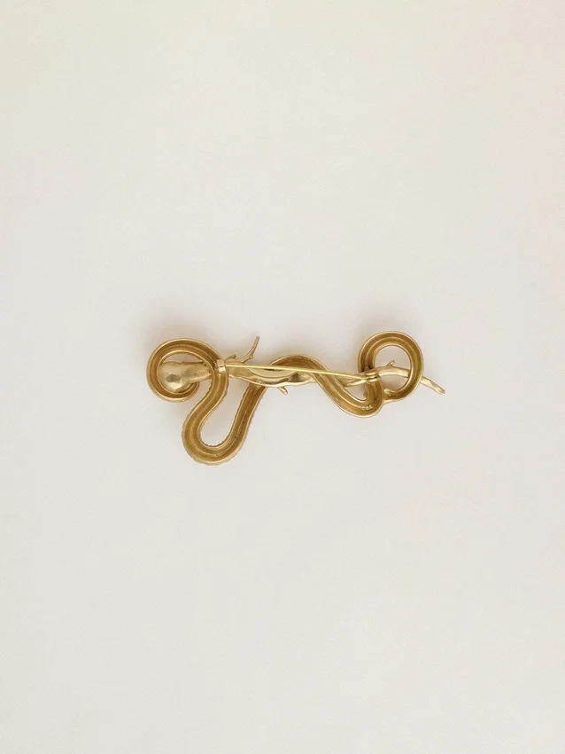 Broche en forme de serpent couleur or antique