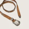 Ceinture fine en dentelle de nubuck couleur noisette avec incrustations décoratives
