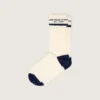 Chaussettes blanc délavé avec revers et détails bleu foncé