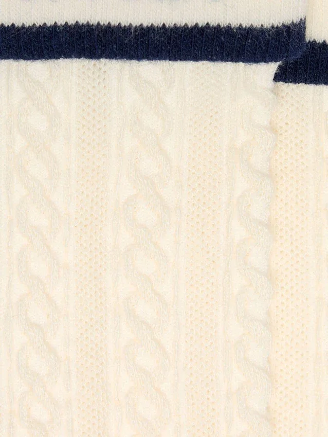 Chaussettes blanc délavé avec revers et détails bleu foncé