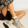 Chaussettes blanc vieilli à rayures bicolores