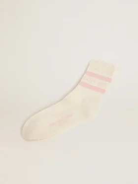 Chaussettes blanches à l'aspect vieilli, avec logo et rayures rose pâle