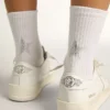 Chaussettes blanches ornées d’une étoile en cristal à l’arrière