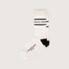 Chaussettes couleur blush avec détails vieillis et rayures noires et blanches