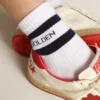 Chaussettes côtelées à rayures bleu marine et logo