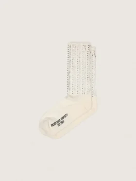 Chaussettes de couleur crème avec détails vieillis et strass