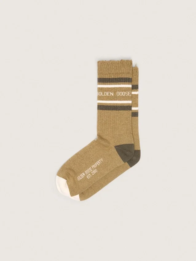 Chaussettes de couleur kaki avec des détails vieillis et des rayures vert foncé et blanches