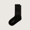 Chaussettes noires avec détails vieillis et strass
