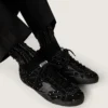 Chaussettes noires avec détails vieillis et strass