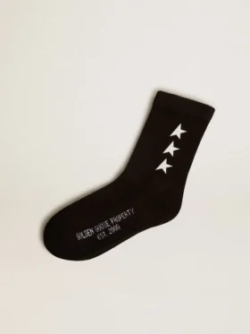 Chaussettes noires ornées d’étoiles blanches contrastantes