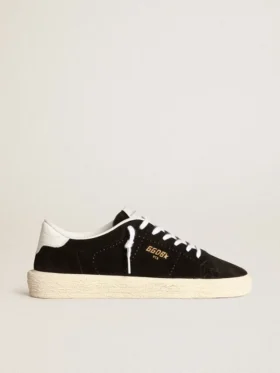 Chaussures de tennis pour femme en daim noir avec languette de talon en cuir blanc