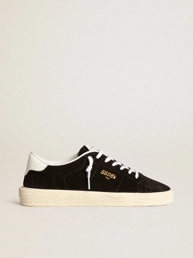 Chaussures de tennis pour femme en daim noir avec languette de talon en cuir blanc