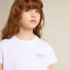 Chemise blanche et argentée avec logo et grande étoile en paillettes argentées