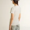 Chemise blanche pour femme avec imprimé sur le devant