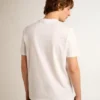 Chemise blanche pour homme avec une étoile pailletée argentée sur le devant