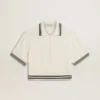 Chemise de polo pour femme en coton blanc délavé avec bordures côtelées bleues