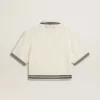 Chemise de polo pour femme en coton blanc délavé avec bordures côtelées bleues