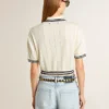 Chemise de polo pour femme en coton blanc délavé avec bordures côtelées bleues